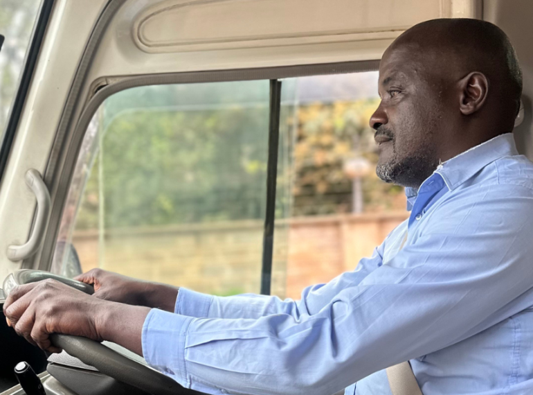 Driver providing a smooth ride as part of our reliable Kenyan chauffeur service.